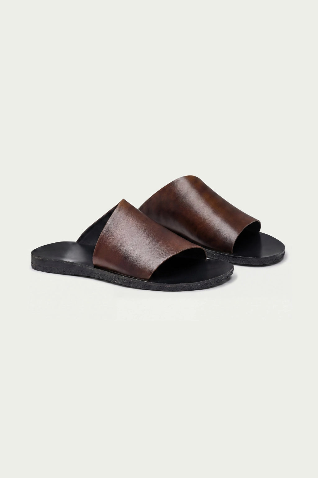 Luciano Slides Brown
