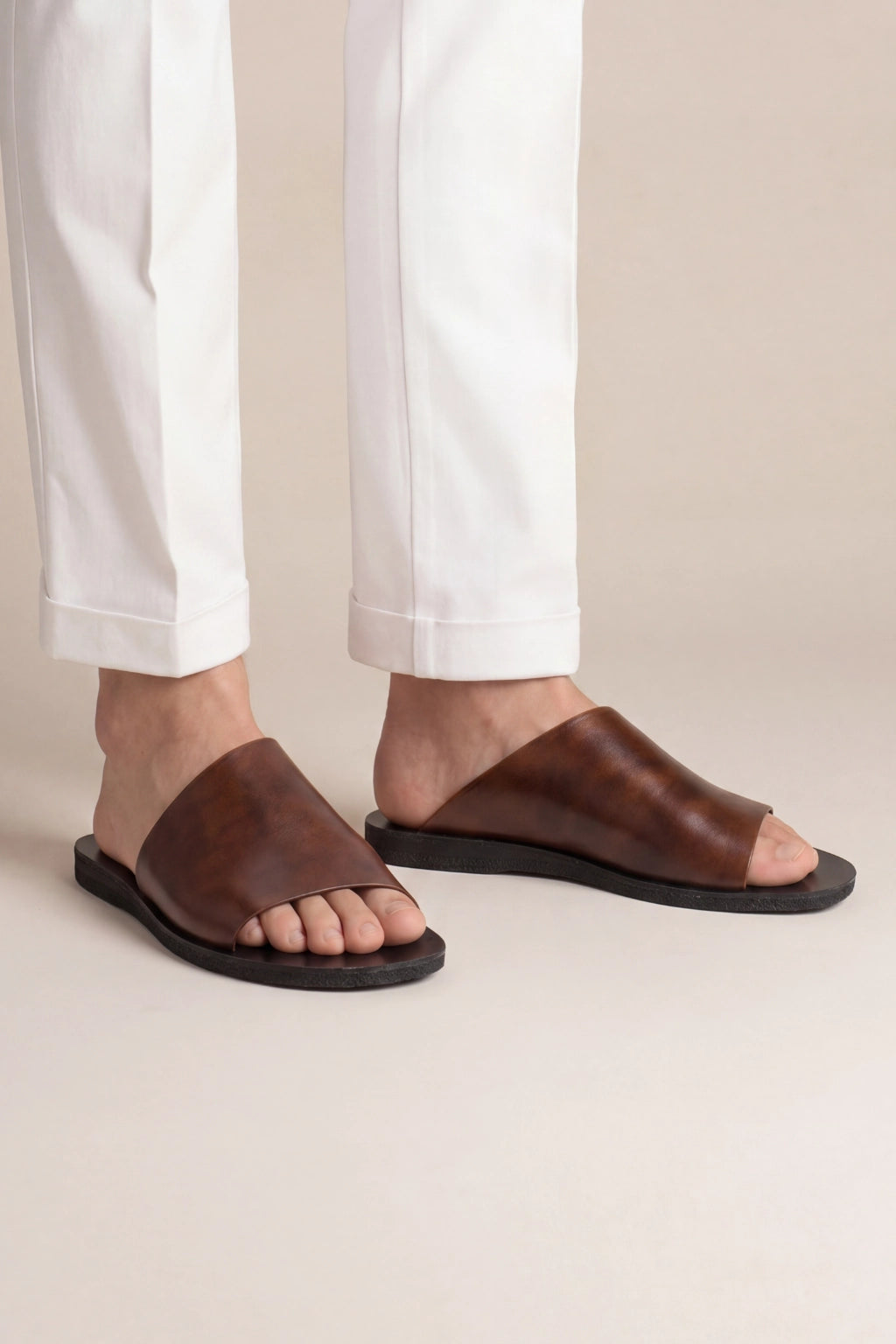 Luciano Slides Brown
